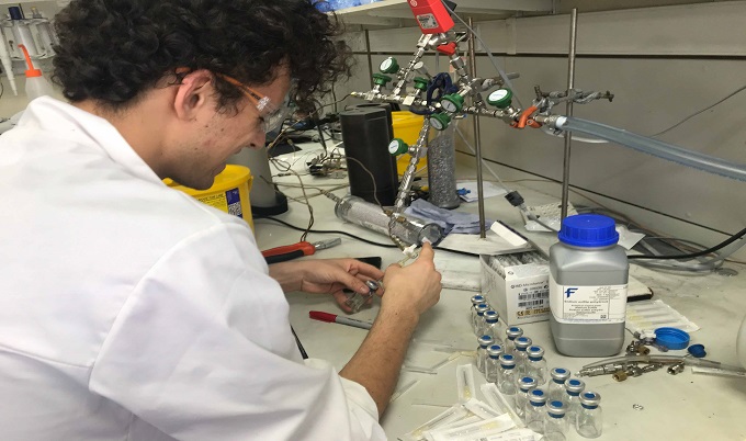 Jordan Stone, who conducted the research as part of his MRes in Environmental Geoscience at Newcastle University, UK, setting up one of the crushed rock experiments